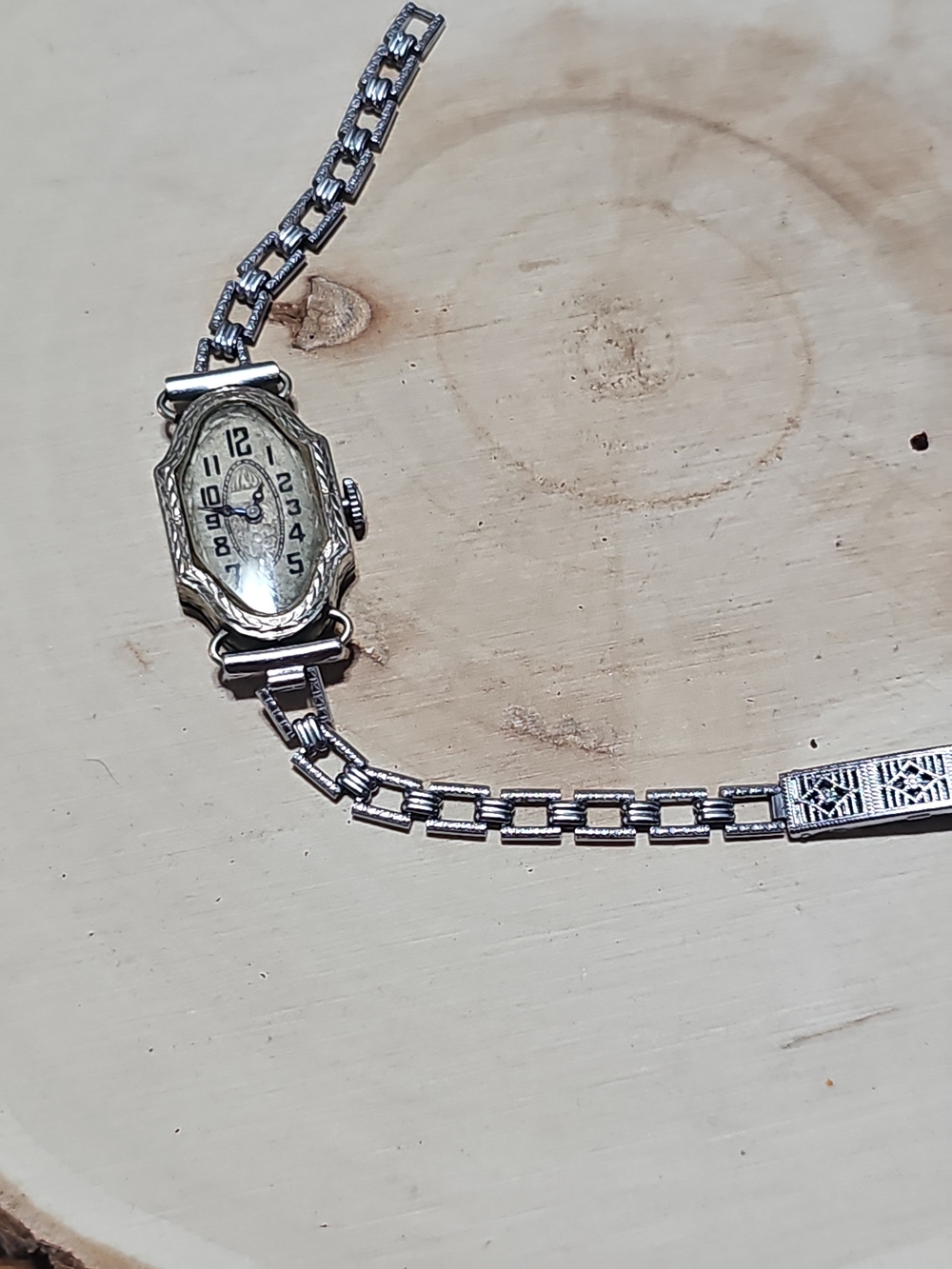 This antique timepiece is a classic 1920s to 1930s Art Deco ladies' mechanical